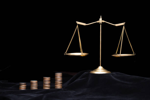 Money saving for education investment plan to study Law lawyer in university. Stack Coin finance increase growth graph to Balance scale gavel concept, copy space black background