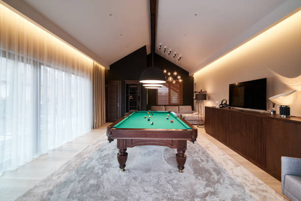 istock modern billiard room with a beautiful table and large windows 1428269771