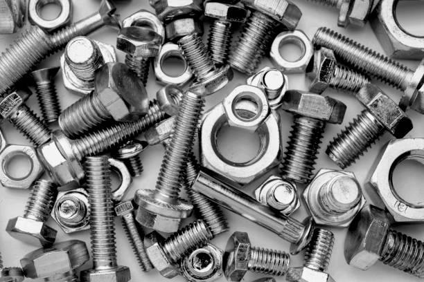 istock nuts and bolts of different types and sizes, which seen from above to create a texture 1428270757