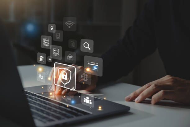 istock Businessman working on laptop with document management icon. 1428271511