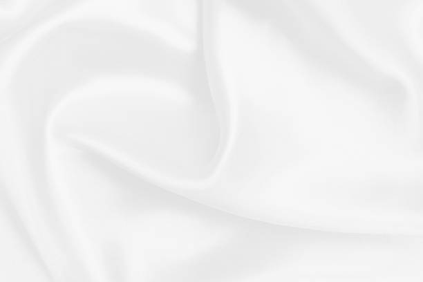 istock White fabric texture background, detail of silk or linen pattern. 1428272669