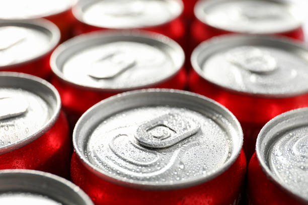 Cans with soda all over background, close up Cans with soda all over background, close up. drink can stock pictures, royalty-free photos & images