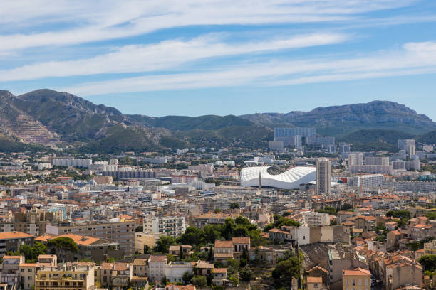 View of Marseille from the Basilica Notre-Dame de la Garde View of Marseille and the rest of the city from the Basilica Notre-Dame de la Garde velodrome stock pictures, royalty-free photos & images
