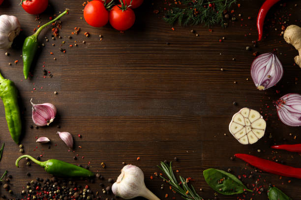 istock Different cooking ingredients and spices on wooden background 1428277848