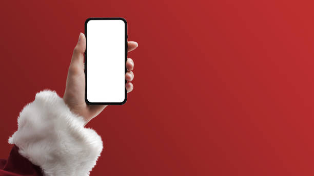 istock Santa Claus holding a smartphone 1428278669