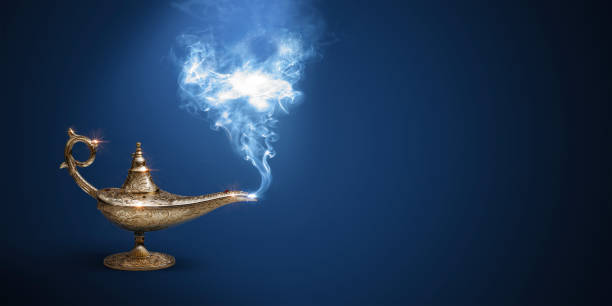 Precious golden magic lamp with smoke on blue background, fairy tales and wish fulfillment concept