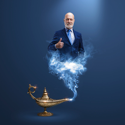 Corporate businessman genie coming out from a magic lamp, he is giving a thumbs up and smiling