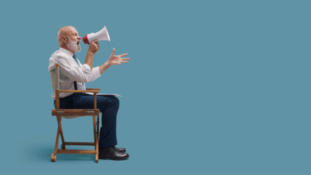 istock Film director shouting with a megaphone 1428280222