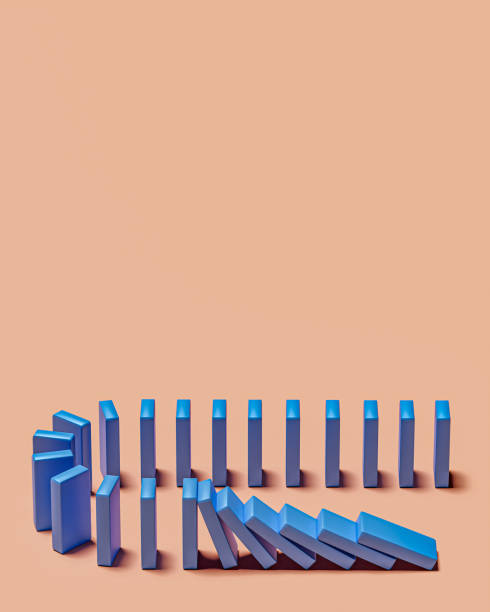 Domino.The blocks are pushing with blank background. Trends and problems concept