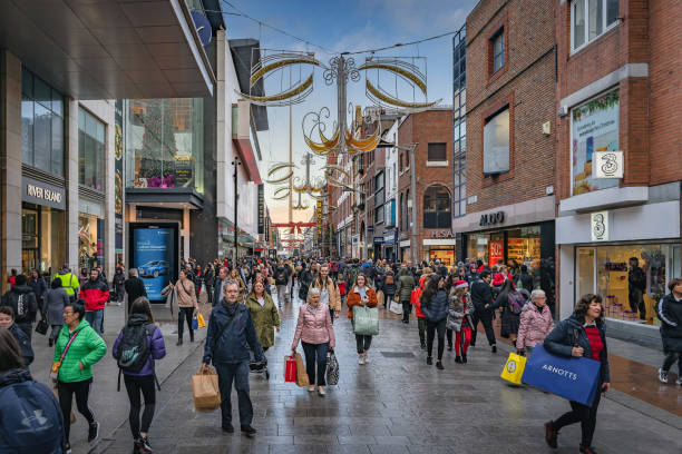 Henry Street decorated for Christmas with crowds of people on shopping spree. Ireland stock photo