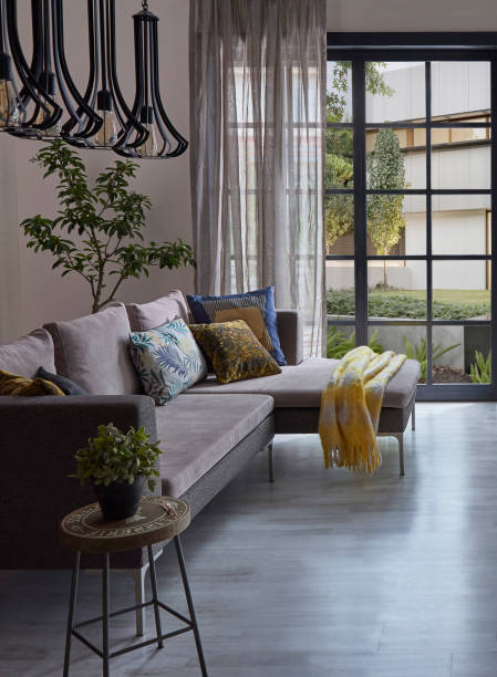 istock Modern rom with working table and armchair style, parquet floor, frame lamp decor, curtain, garden view house interior. 1428293068