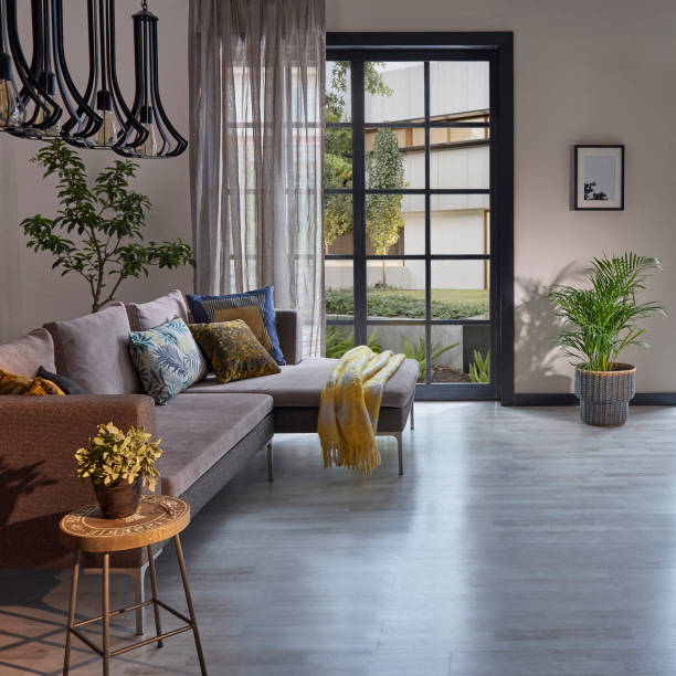 istock Modern rom with working table and armchair style, parquet floor, frame lamp decor, curtain, garden view house interior. 1428293339