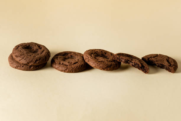 istock Tasty Chocolate Chip Cookies on Yellow Background Horizontal 1428296538