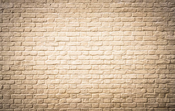 Off white painted large brick wall surface stock photo