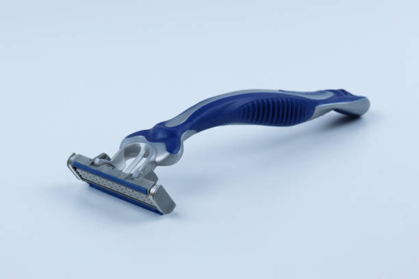 istock Blue shaving razor isolated on white background 1428299559
