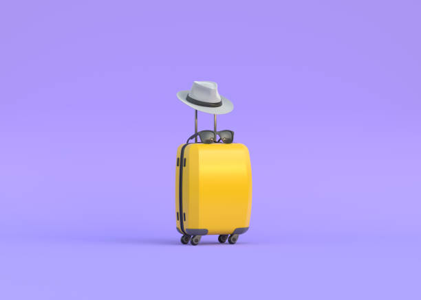 istock Suitcase with hat and sunglasses on a purple background 1428315968
