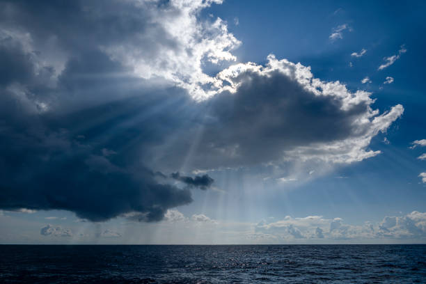 istock Sunbeams seeping through the clouds in the Mediterranean. 1428329065