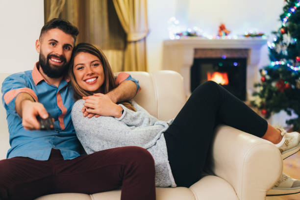 istock Couple spending Christmas together at home 1428333578