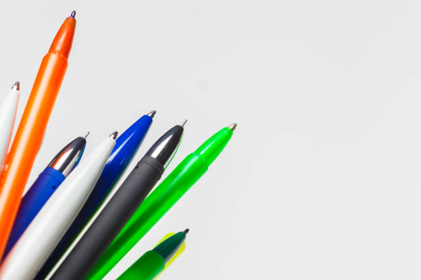 istock different colors pens isolated on the white background 1428333983