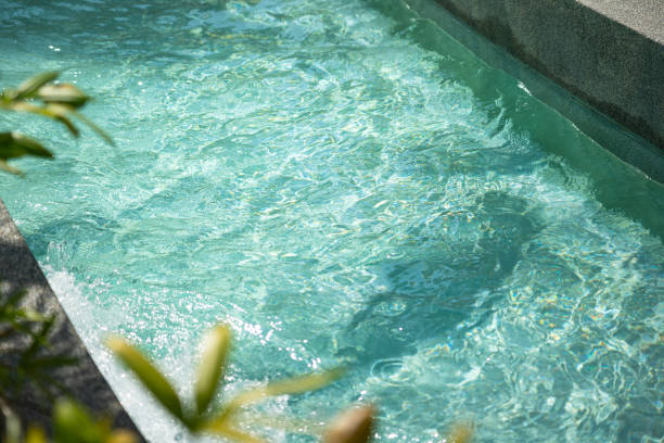 istock Transparent turquoise water swimming pool. 1428334694