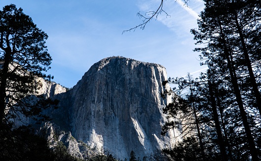 Half Dome rock of Yosemite National park in the clouds. Medium format Fuji Velvia 100 film.