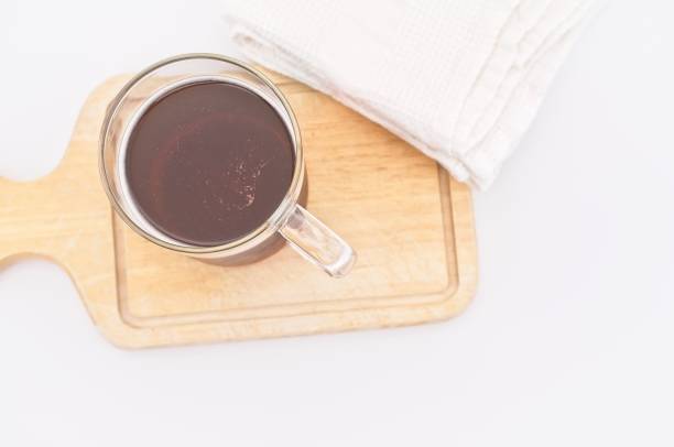 istock beer glass on a wooden cutting board with kitchen cloth on a white table 1428340342