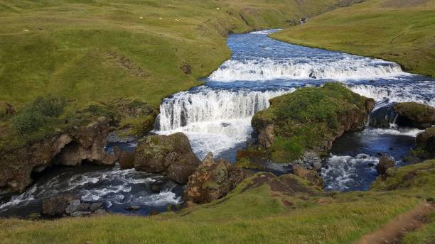 istock Typical Waterfall in Iceland with a beautiful Rainbow 1428342912