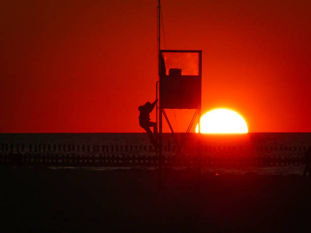 Sun is setting over by the sea.Marmara sea - Istanbul - Turkey.