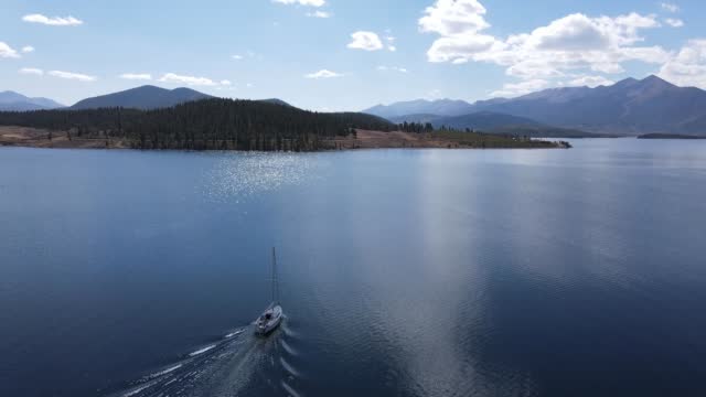 Aerial view of a sailboat on the water in Lake Dillon in Frisco, Colorado