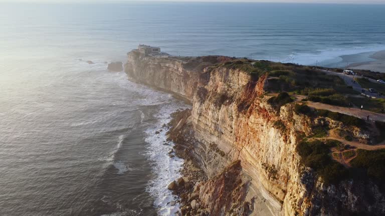 Aerial shot of sea cliffs on the coast of Nazare, Portugal