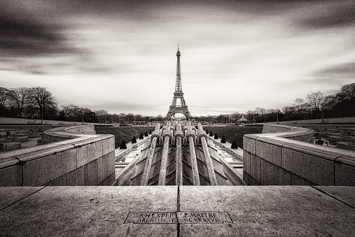 A dramatic scenery of the famous Eiffel Tower in Paris, France