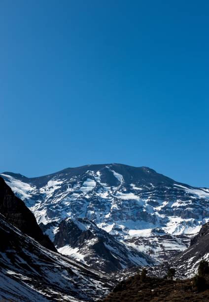 istock Vertical of a beautiful snowy mountain. 1428353126