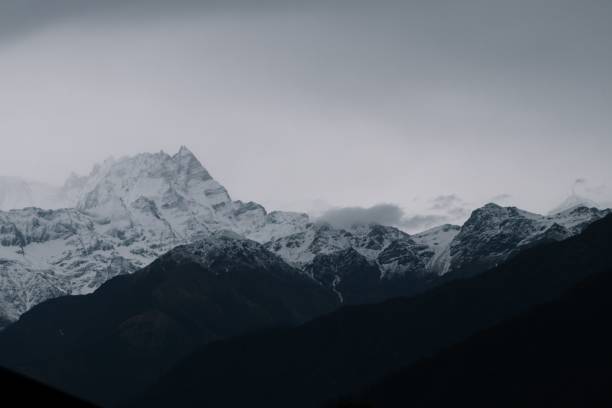 istock Scenic view of a mountain peak covered with snow 1428353853