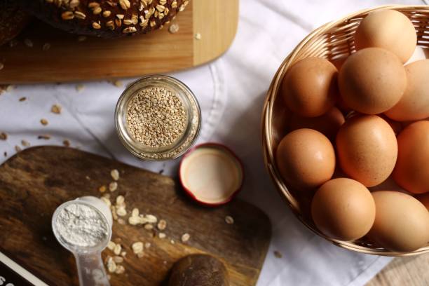 istock Top view shot of a kitchen table with ingredients to make bread 1428356225