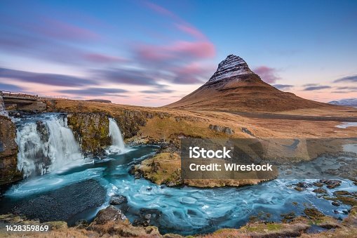 istock Breathtaking landscape with waterfall near Kirkjufellsfoss and Kirkjufell hills in Iceland 1428359869