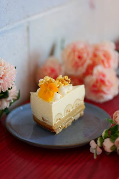 istock Slice of cake with flower design on a plate 1428360228
