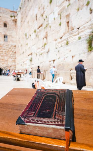 istock Holy book in front of Western Wall 1428363503