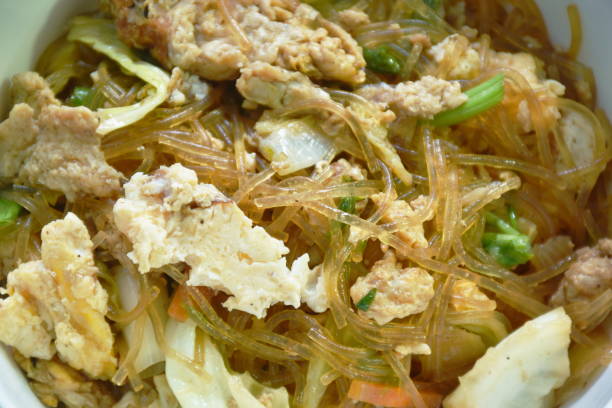 istock fried glass noodles slice pork and cabbage with egg 1428370939