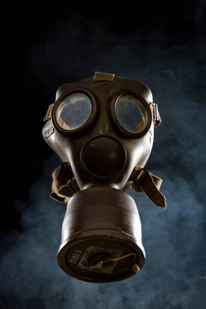 istock World War II Gas Mask isolated on a smoke black background 1428374049