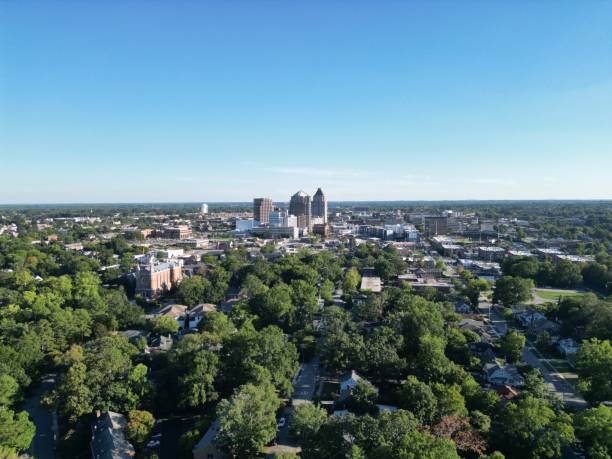istock High-angle panoramic shot of Greensboro on a clear summer afternoon 1428375132
