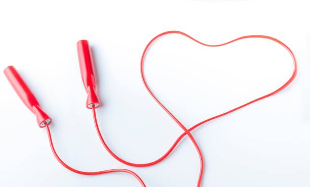 istock Heart-shaped red jump rope isolated on a white background 1428375680