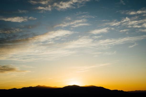 istock Silhouette of mountains during sunset under blue bright sky 1428377820