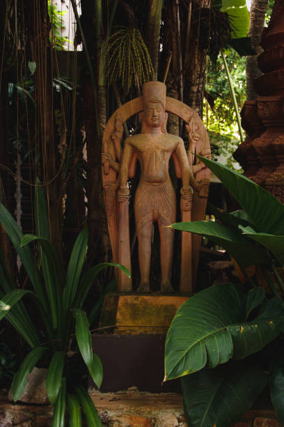 istock Buddhist statue in a garden 1428383063