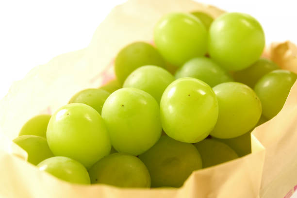 shine muscat fruits on white background