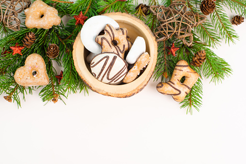 Nurnberg elisen gingerbread mix, traditional german christmas sweets with fir branches and pine cones, holiday background with copy space
