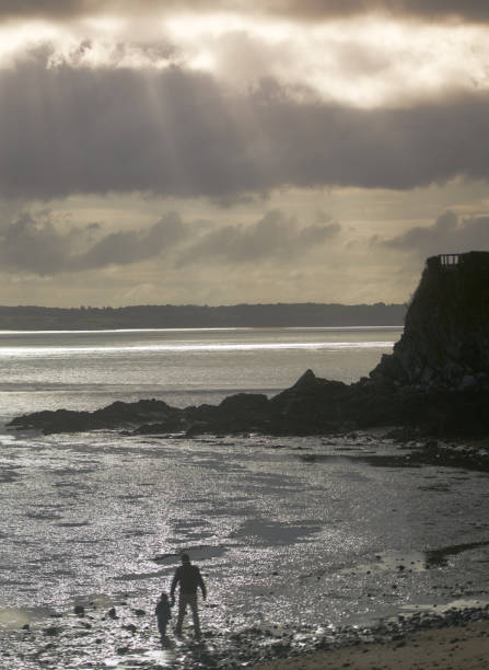 Saint-Brieuc father and son playing on the beach at low tide