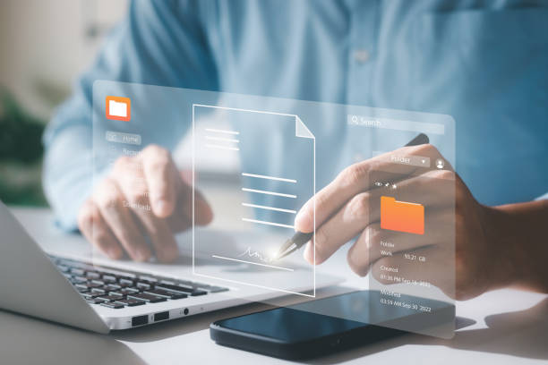 istock Electronic signature concept, business people sign electronic documents on digital documents, paperless office, future business contract signing. 1428397188