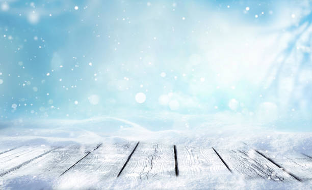 istock An original background image with a wooden base, a sparkling blue and white backdrop and space for text. 1428401392