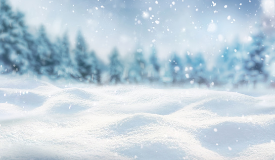 istock Beautifull background on a Christmas theme with snowdrifts, snowfall and a blurred background. 1428401936