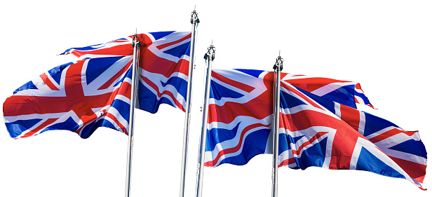 Union Jack Flags. Collection of four national UK flags with flagpole, blowing in the wind, isolated on white background. Two couples, Photography.